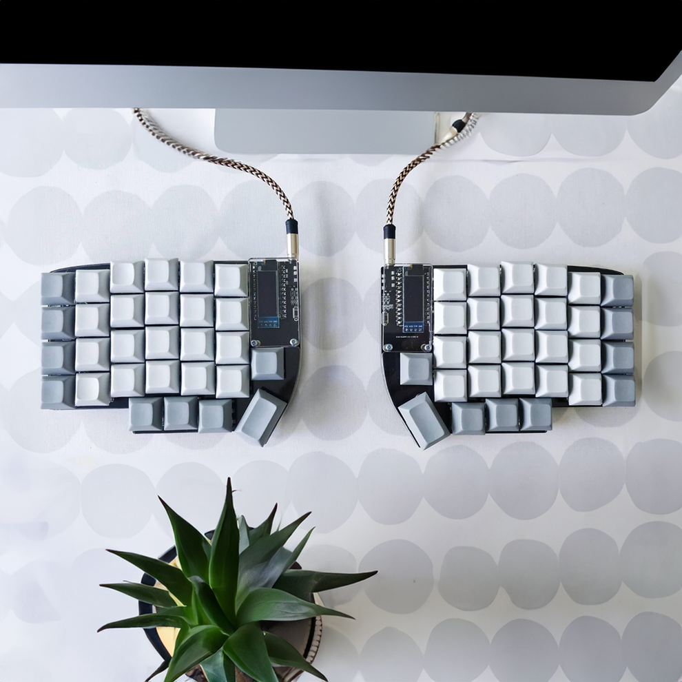 Lil58. Also a small split keyboard, with the same layout.
